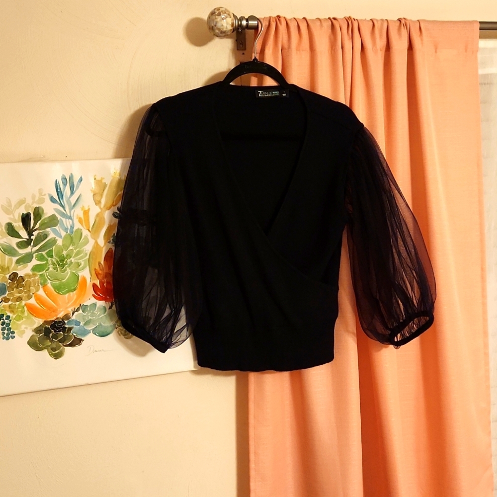 A black sweater by 7thAvenue NYC-L $18